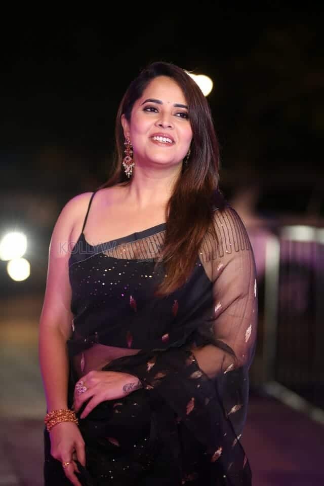 Actress Anasuya Bharadwaj at Pedha Kapu 1 Movie Pre Release Event Glam Photos 19