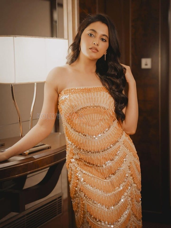 Captivating Priyanka Mohan in a Golden Embellished Strapless Gown Pictures 03