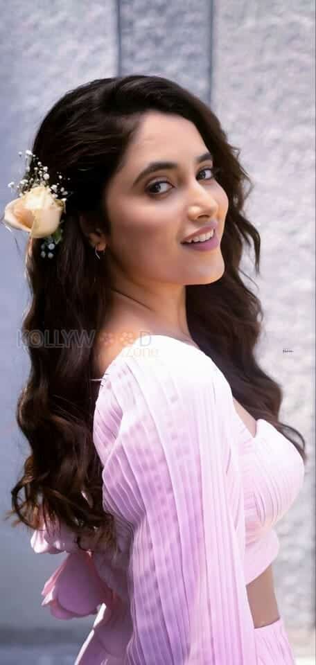 Cute Priyanka Arul Mohan with a Flower Photo 01
