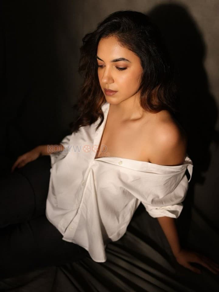 Elegant Ritu Varma in a White Shirt and Dark Pant Photos 01