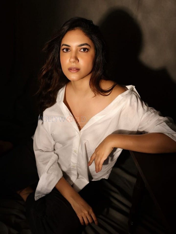 Elegant Ritu Varma in a White Shirt and Dark Pant Photos 05
