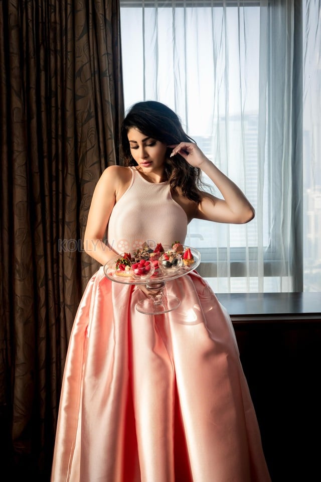 Gorgeous Mouni Roy in a Pink Ribbed Top with a Pink Taffeta Skirt Pictures 02