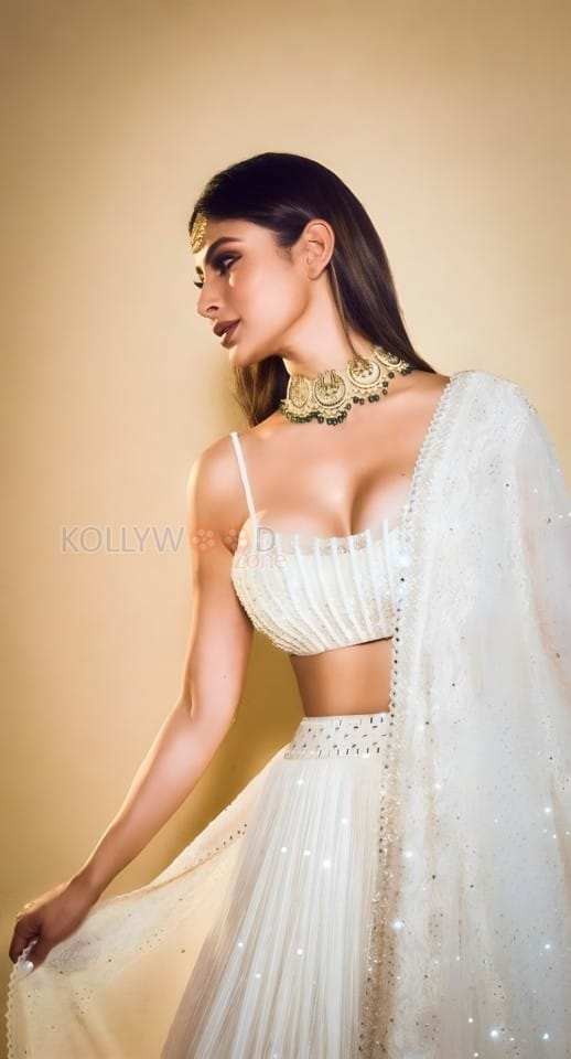 Graceful Mouni Roy in a White Lehenga Photos 01