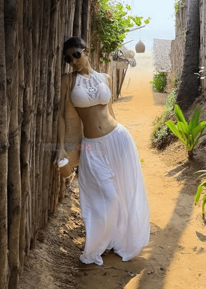 Hot Diva Mouni Roy in a White Crochet Bralette Pictures 02
