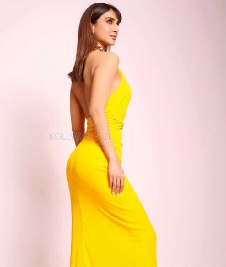 Model Vaani Kapoor in a Yellow Drape Dress Photos 02