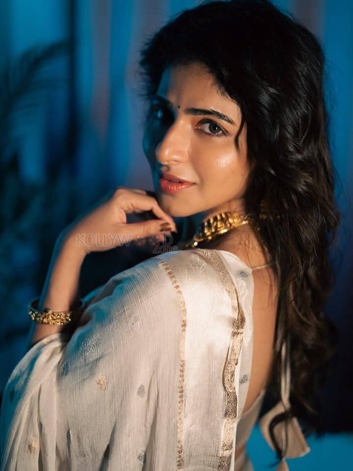 Radiant Iswarya Menon in a White Silk Saree Photos 02