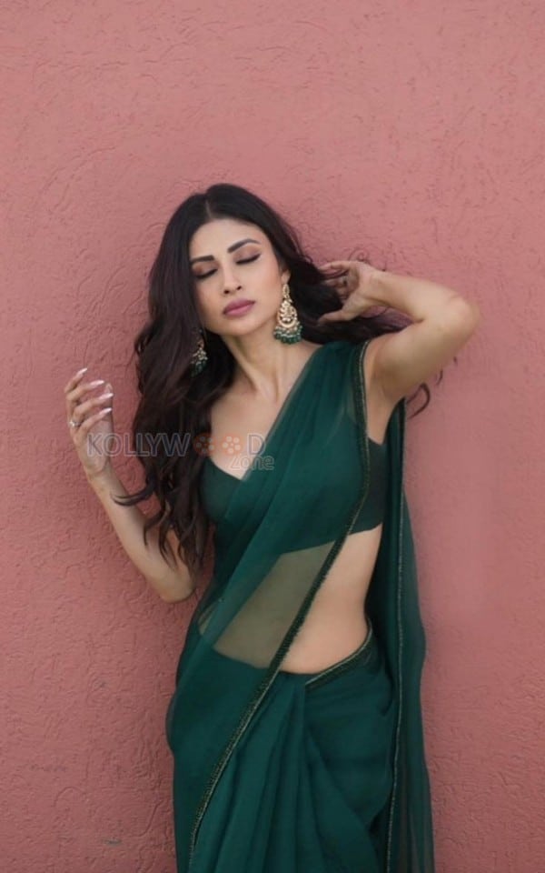 Sexy Mouni Roy in a Plain Green Saree with a Green Strappy Blouse Photos 02