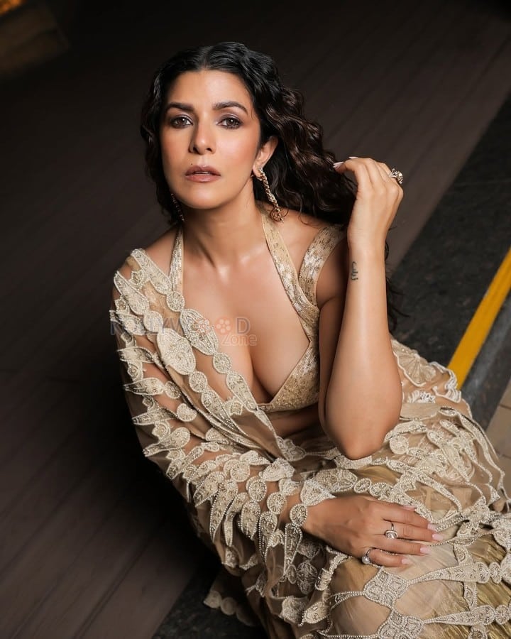 Sexy Nimrat Kaur in a Double Strap Plunging Neckline Blouse with a Transparent Saree at IIFA Digital Awards 2025 Photos 01