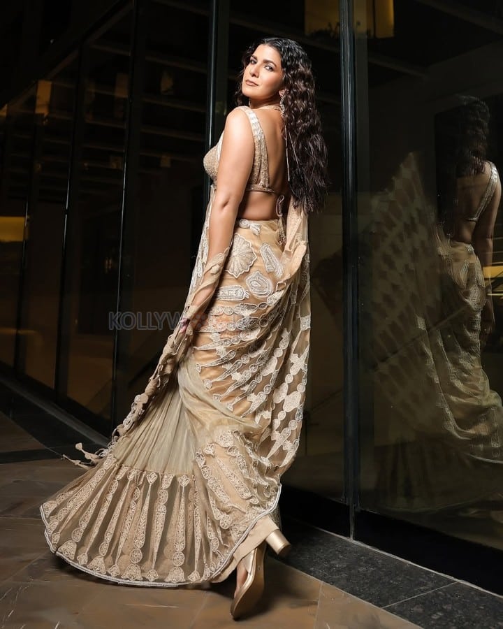 Sexy Nimrat Kaur in a Double Strap Plunging Neckline Blouse with a Transparent Saree at IIFA Digital Awards 2025 Photos 02
