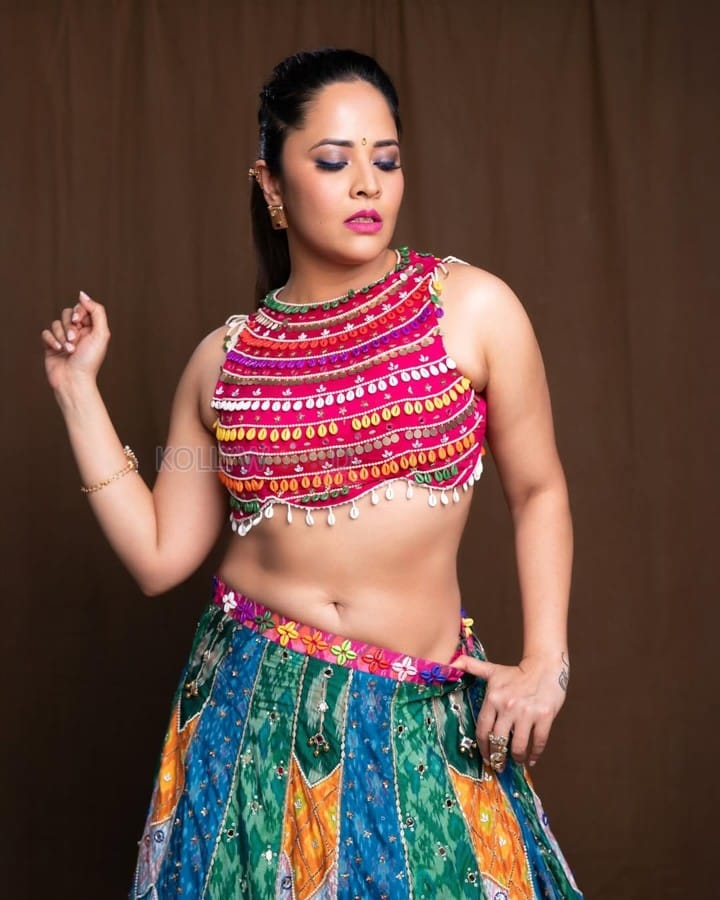 Stunning Anasuya Bharadwaj Navel in a Colourful Lehenga Pictures 03
