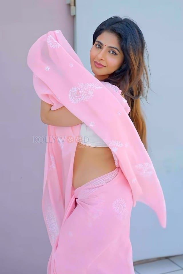 Stunning Iswarya Menon in a Pink Saree with a White Sleeveless Blouse Photos 01