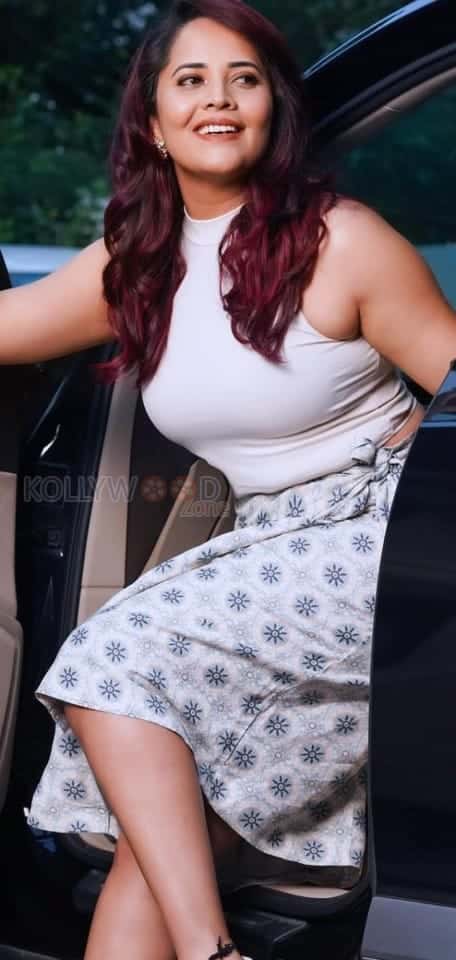 Stylish Anusuya Bharadwaj in a White Tank Top Pictures 01