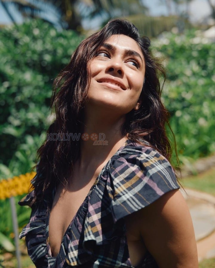 Actress Mrunal Thakur in a Cutout Check Maxi Dress Pictures 02