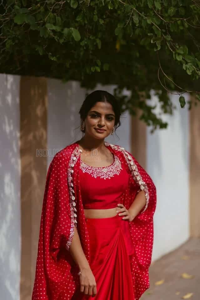 Actress Nikhila Vimal in a Red Silk Printed Cape and Skirt Photos 03