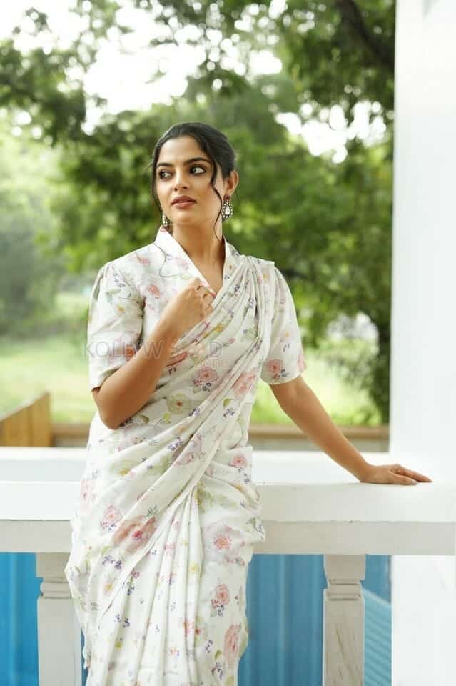 Actress Nikhila Vimal in a White Floral Dress Photos 01