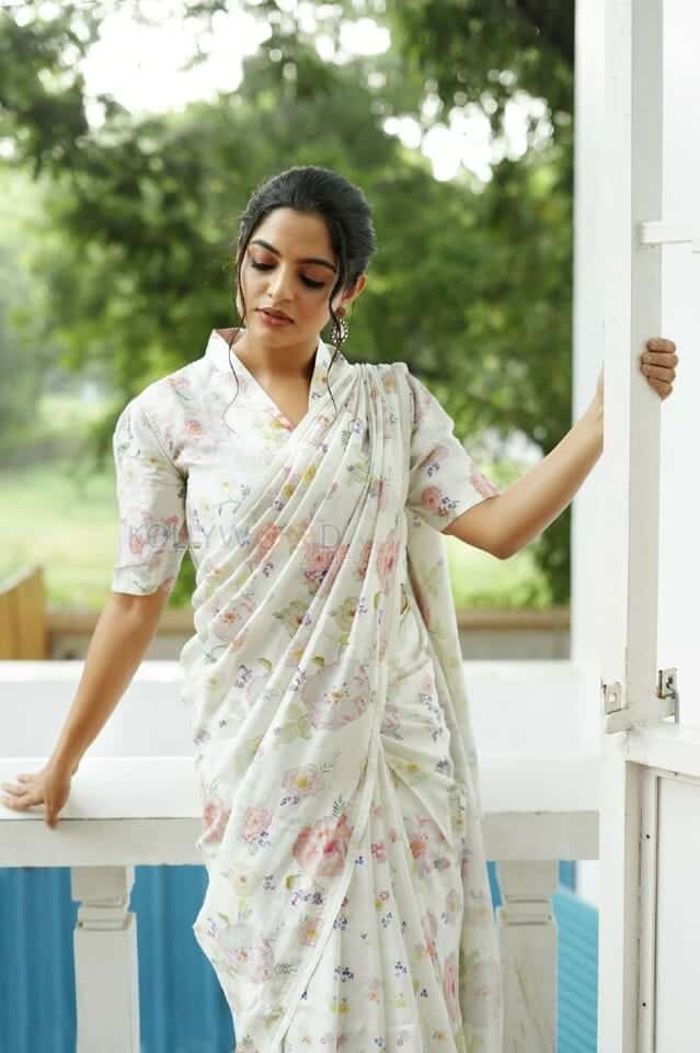 Actress Nikhila Vimal in a White Floral Dress Photos 04
