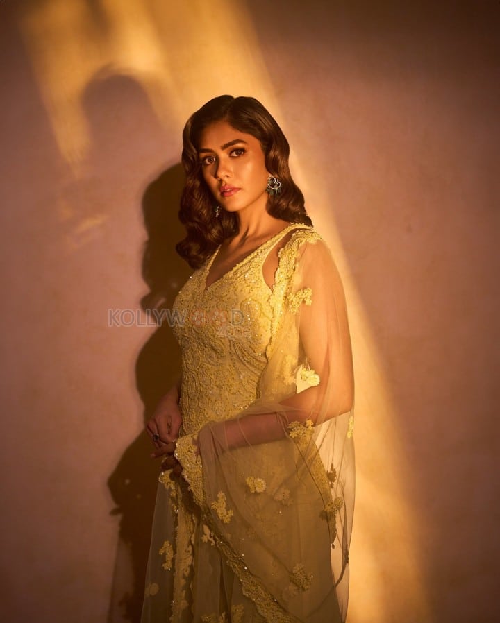 Beautiful Mrunal Thakur in a Yellow Sleeveless Sharara Set Photos 08