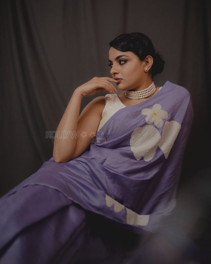 Beautiful Nikhila Vimal in a Floral Print Saree with a White Sleeveless Blouse Photos 03