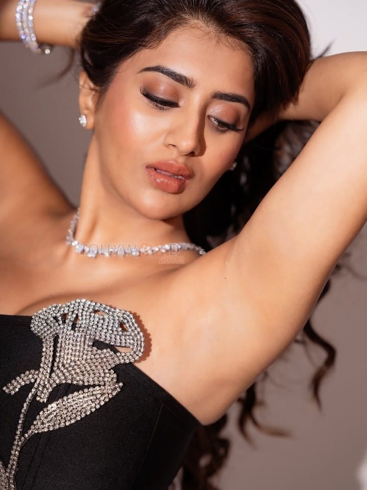 Bold Rashi Singh in a Black Strapless Gown Pictures 01