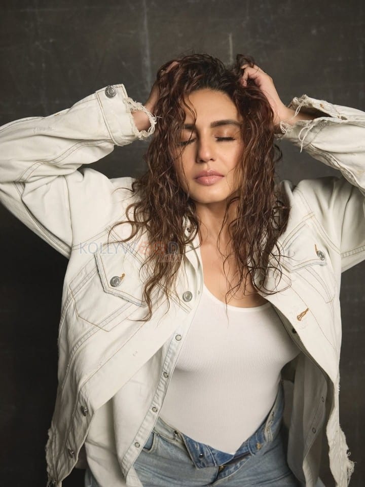 Casual Beauty Huma Qureshi in a White Tank Top and Oversized Denim Jacket Pictures 01