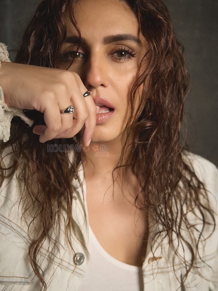 Casual Beauty Huma Qureshi in a White Tank Top and Oversized Denim Jacket Pictures 03