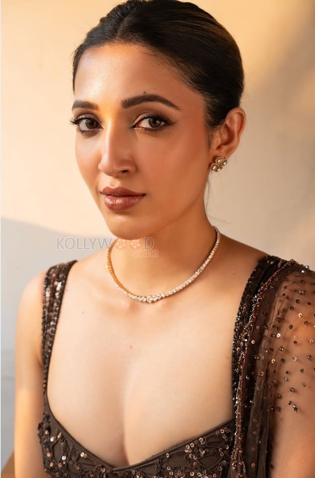 Charming Beauty Neha Shetty in a Golden Lehenga with Sleeveless Blouse Photos 02