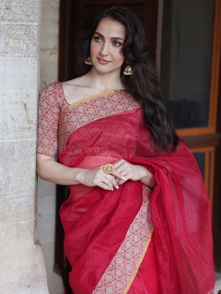 Elegant Elli AvrRam in a Traditional Red and Golden Border Saree Photos 03