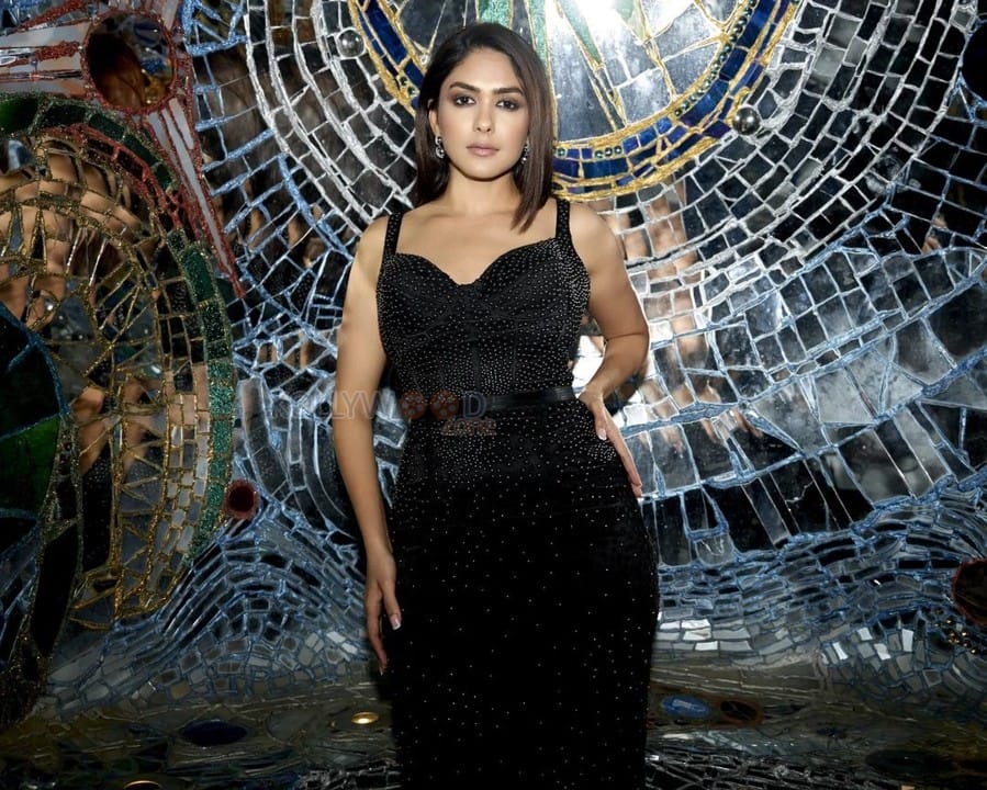 Glam Mrunal Thakur in a Black Shimmering Maxi Dress Photoshoot Pictures 04