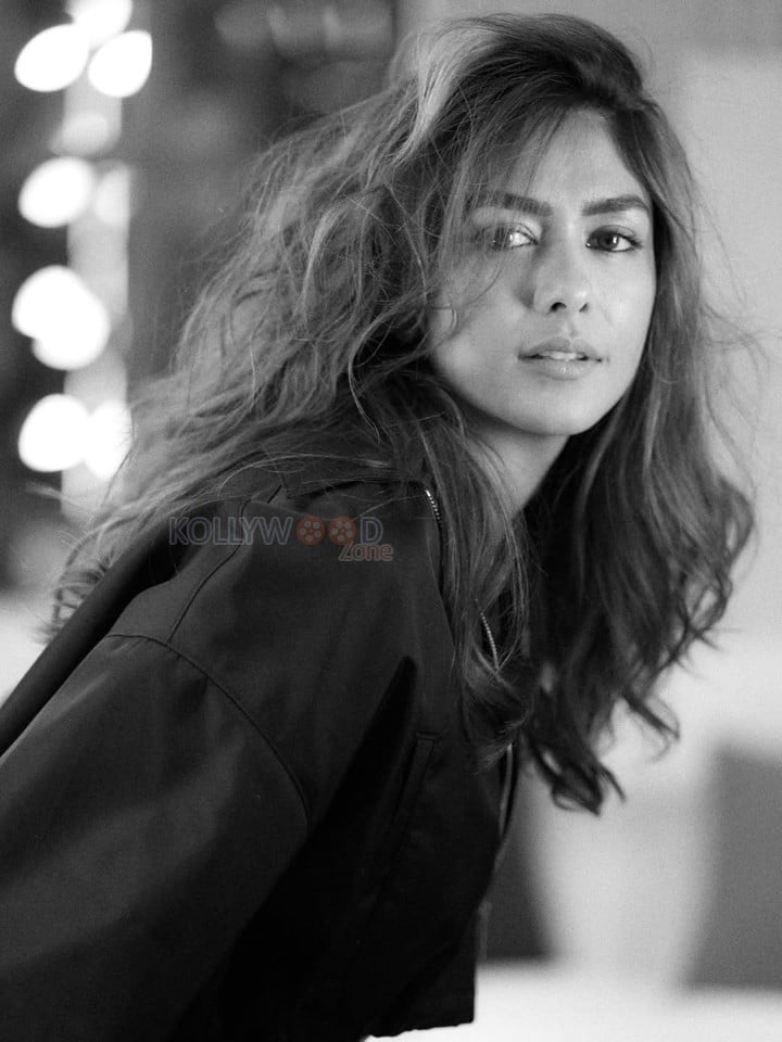 Glamorous and Sexy Mrunal Thakur in a Black Top with High Waisted Jeans Black and White Photos 01