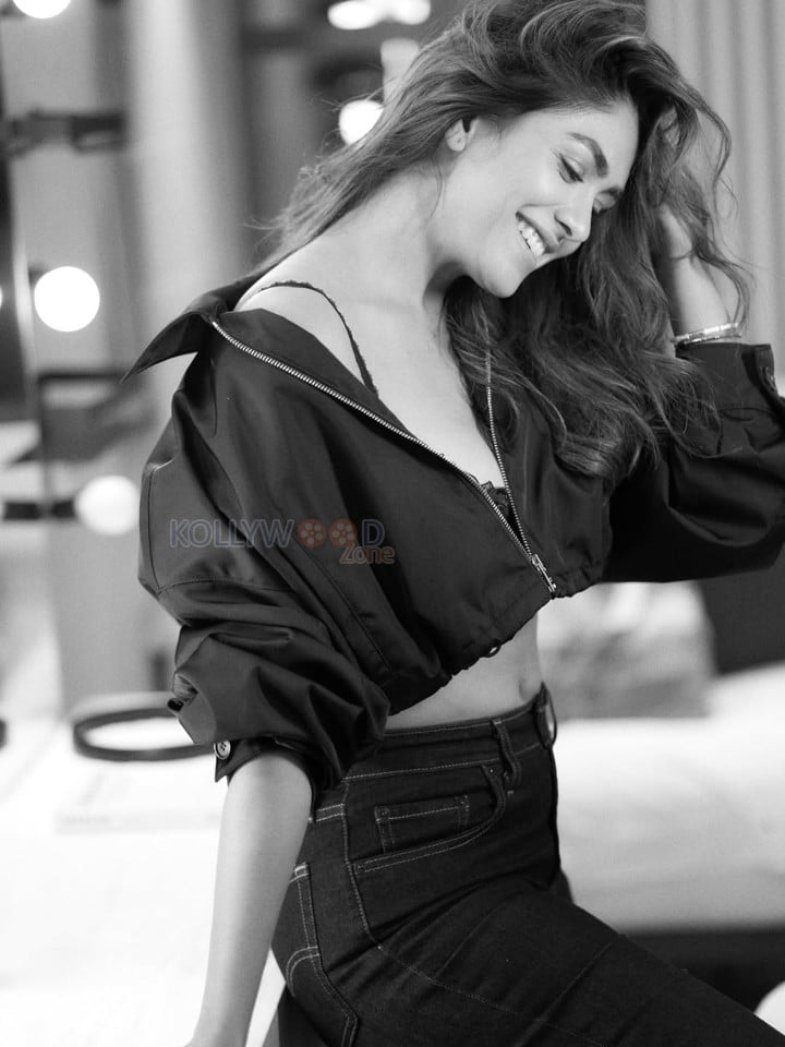 Glamorous and Sexy Mrunal Thakur in a Black Top with High Waisted Jeans Black and White Photos 04