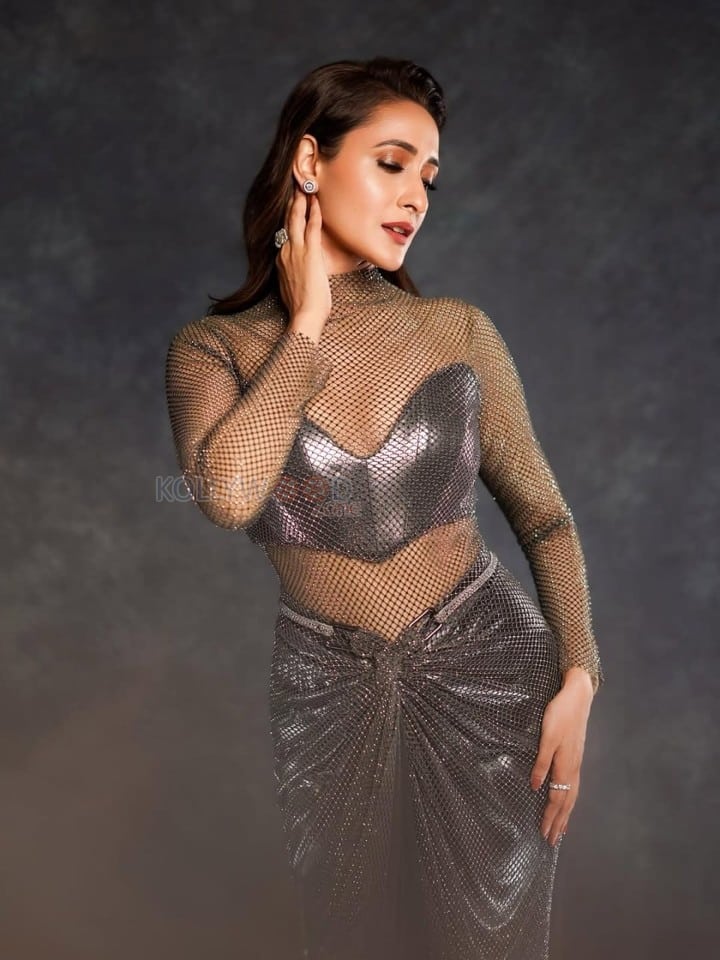Gorgeous Pragya Jaiswal in a Netted See Through Dress with a Sleeveless Bralette and Skirt Pictures 02