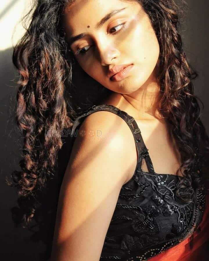 Petite Anupama Parameswaran Hot and Sexy Red Saree Photoshoot Pictures 01
