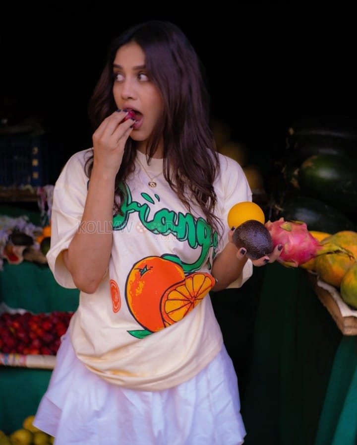 Pretty Nabha Natesh in a Playful T Shirt and Mini Skirt Pictures 04