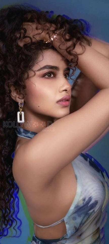 Ravishing Anupama Parameswaran in a Blue Halter Neck Sleeveless Bodycon Dress Pictures 03