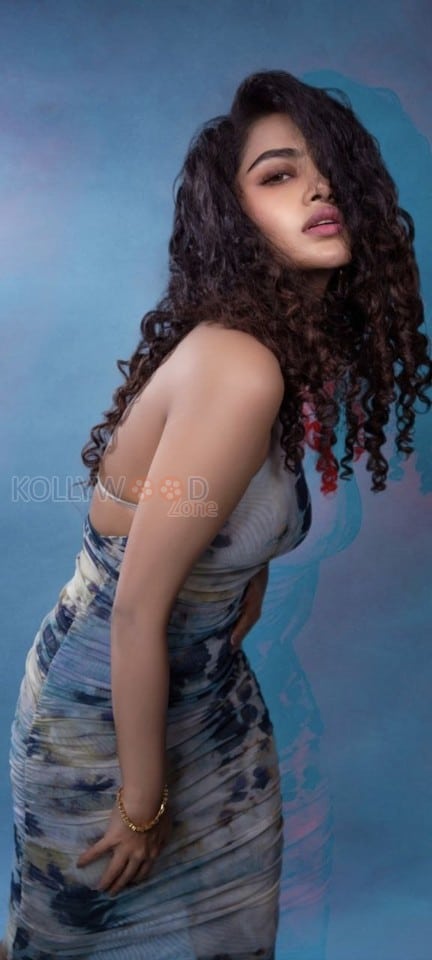 Ravishing Anupama Parameswaran in a Blue Halter Neck Sleeveless Bodycon Dress Pictures 06