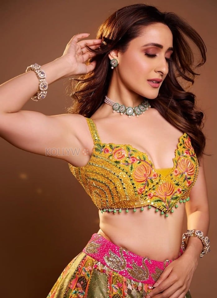 Riveting Pragya Jaiswal in a Yellow Floral Lehenga Photos 03