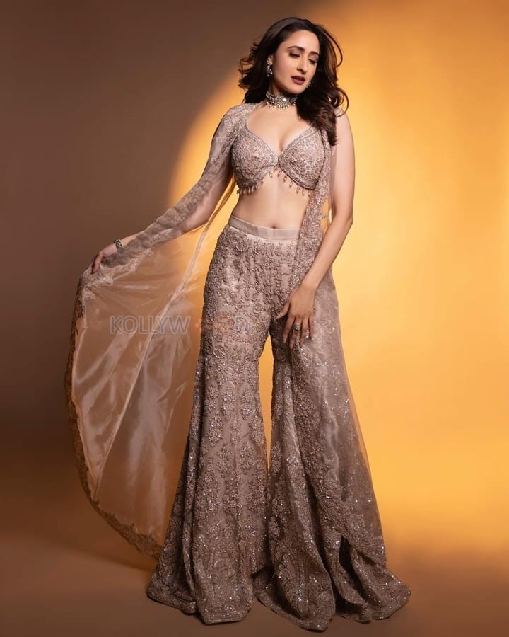 Sexy Pragya Jaiswal in a Shimmering Cream Bralette with a Palazzo and Shrug Photos 01