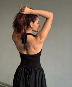 Sleek Actress Pragya Jaiswal in a Black halter neck bubble gown Photos 04