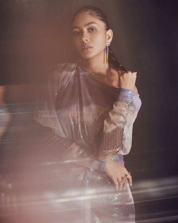 Sparkling Mrunal Thakur in a Purple Sequin Tulle Off Shoulder Dress Photoshoot Pictures 01
