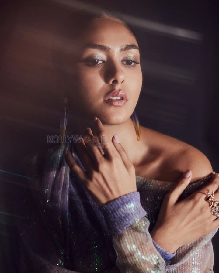 Sparkling Mrunal Thakur in a Purple Sequin Tulle Off Shoulder Dress Photoshoot Pictures 03