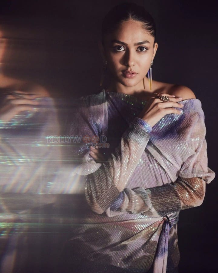 Sparkling Mrunal Thakur in a Purple Sequin Tulle Off Shoulder Dress Photoshoot Pictures 06