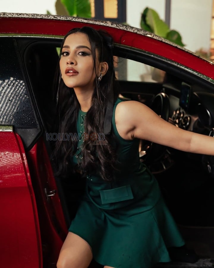 Stunning Nabha Natesh in a Dark Green Mini Dress with Long Boots Photos 01