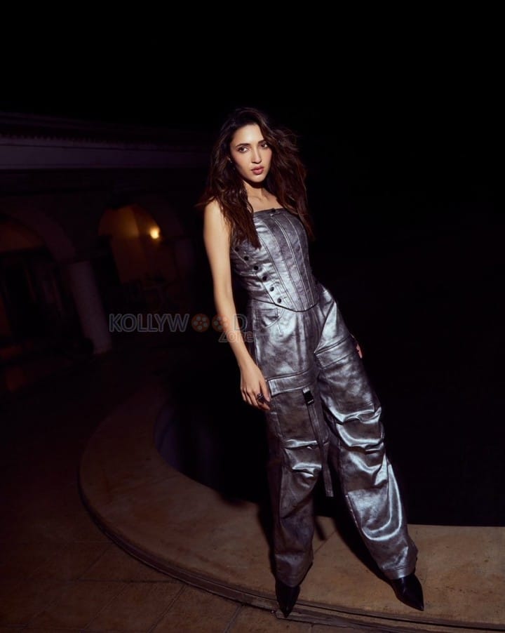 Stunning Young Beauty Neha Shetty in a Metallic Off Shoulder Corset Top and Pant Photos 02