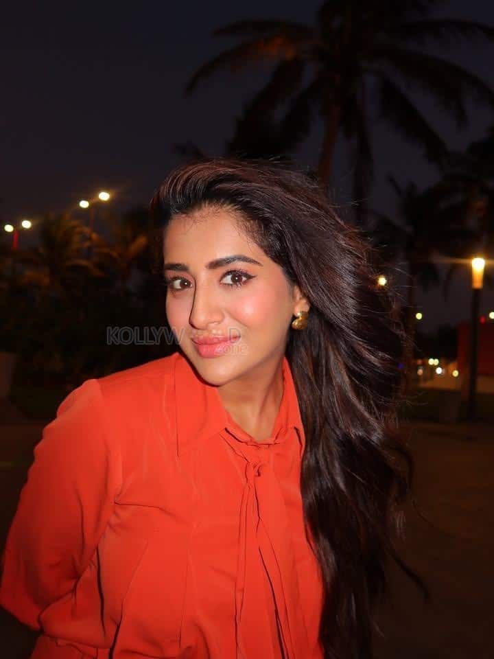 Stylish Rashi Singh in an Orange Button Down Shirt at Jeddah Waterfront in Saudi Arabia Photos 02
