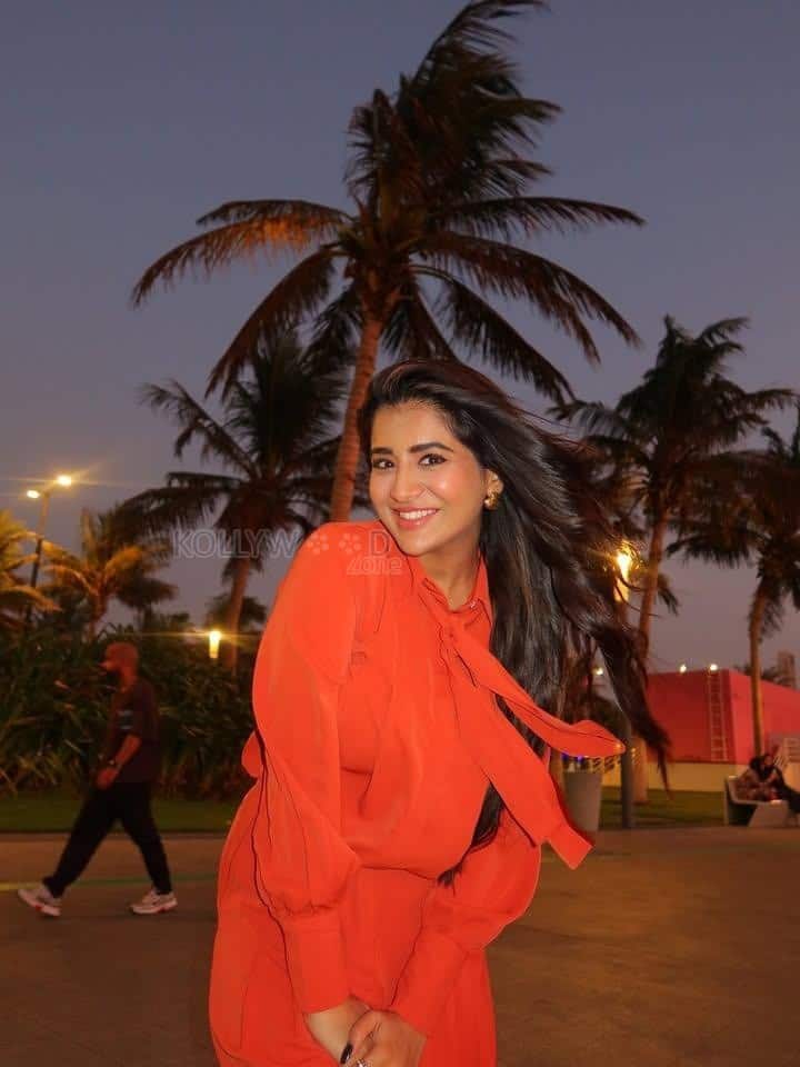 Stylish Rashi Singh in an Orange Button Down Shirt at Jeddah Waterfront in Saudi Arabia Photos 03