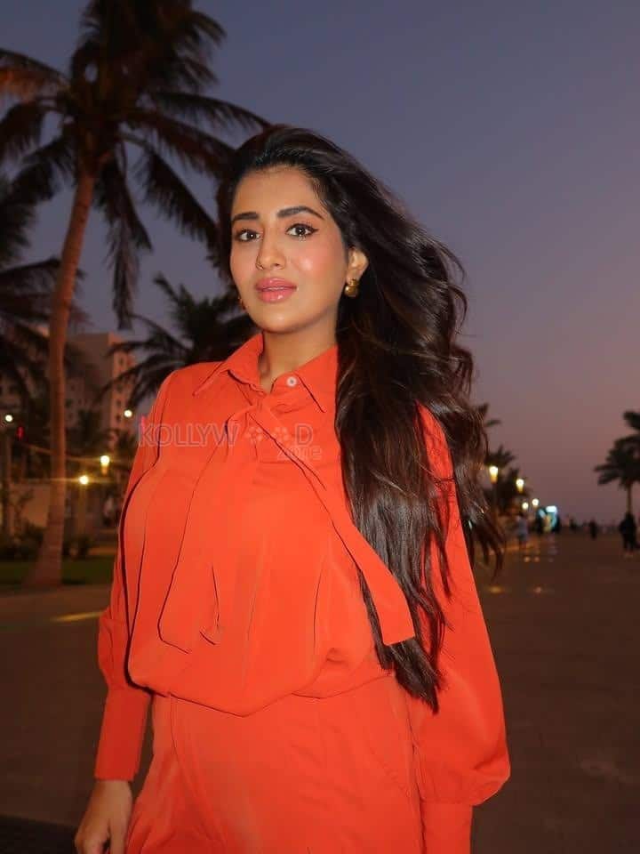 Stylish Rashi Singh in an Orange Button Down Shirt at Jeddah Waterfront in Saudi Arabia Photos 04