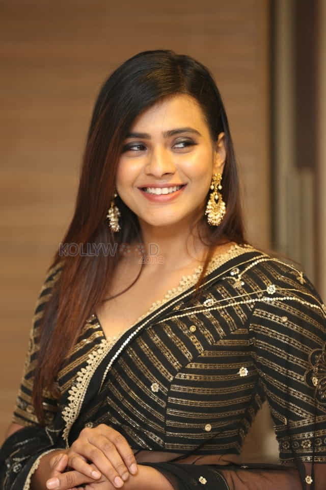 Actress Hebah Patel At Kisses Pre Release Event Photos