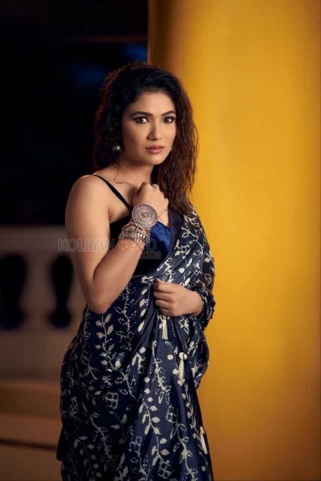 Actress Ridhima Pandit in a Sexy Saree Photoshoot Pictures 01