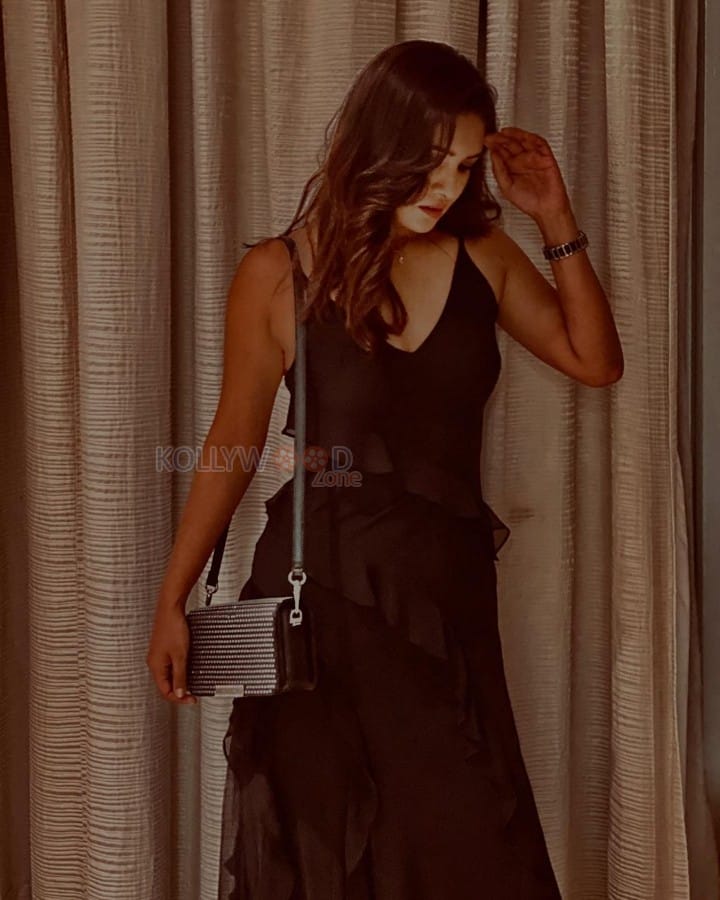 Actress Vani Bhojan in a Black Maxi Dress Photos 01