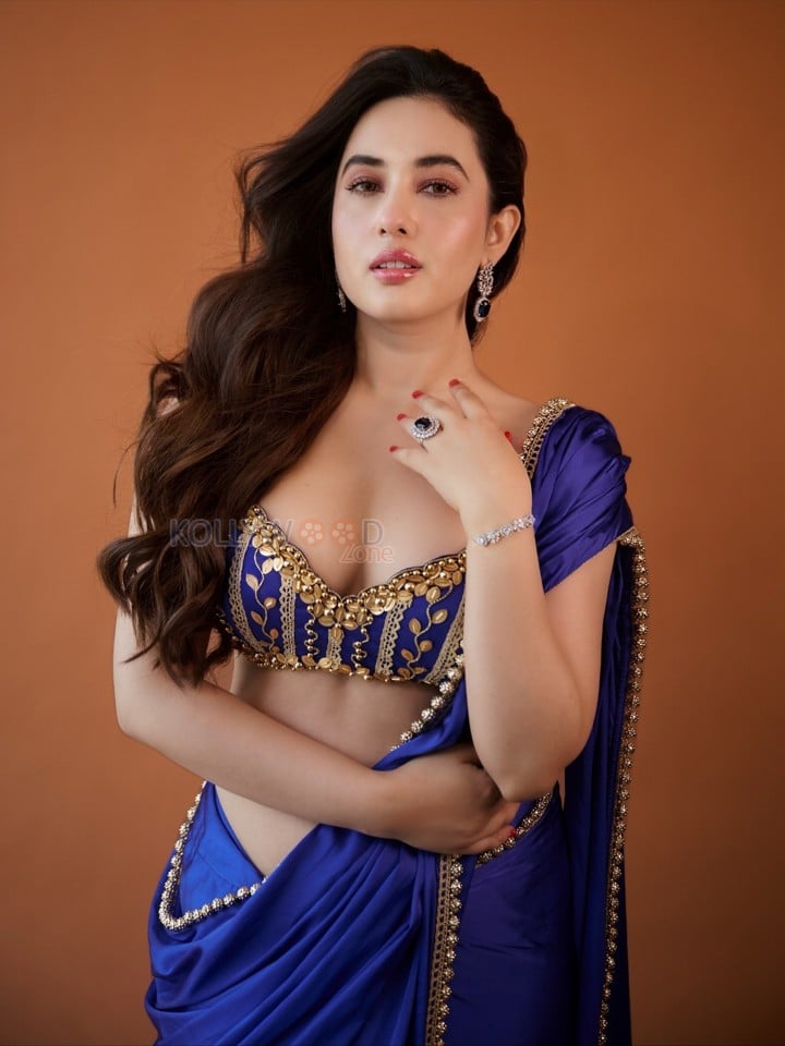 Bold Aditi Budhathoki in a Royal Blue Saree Pictures 01